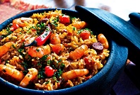 spanish rice with tomatoes, red peppers and carrots